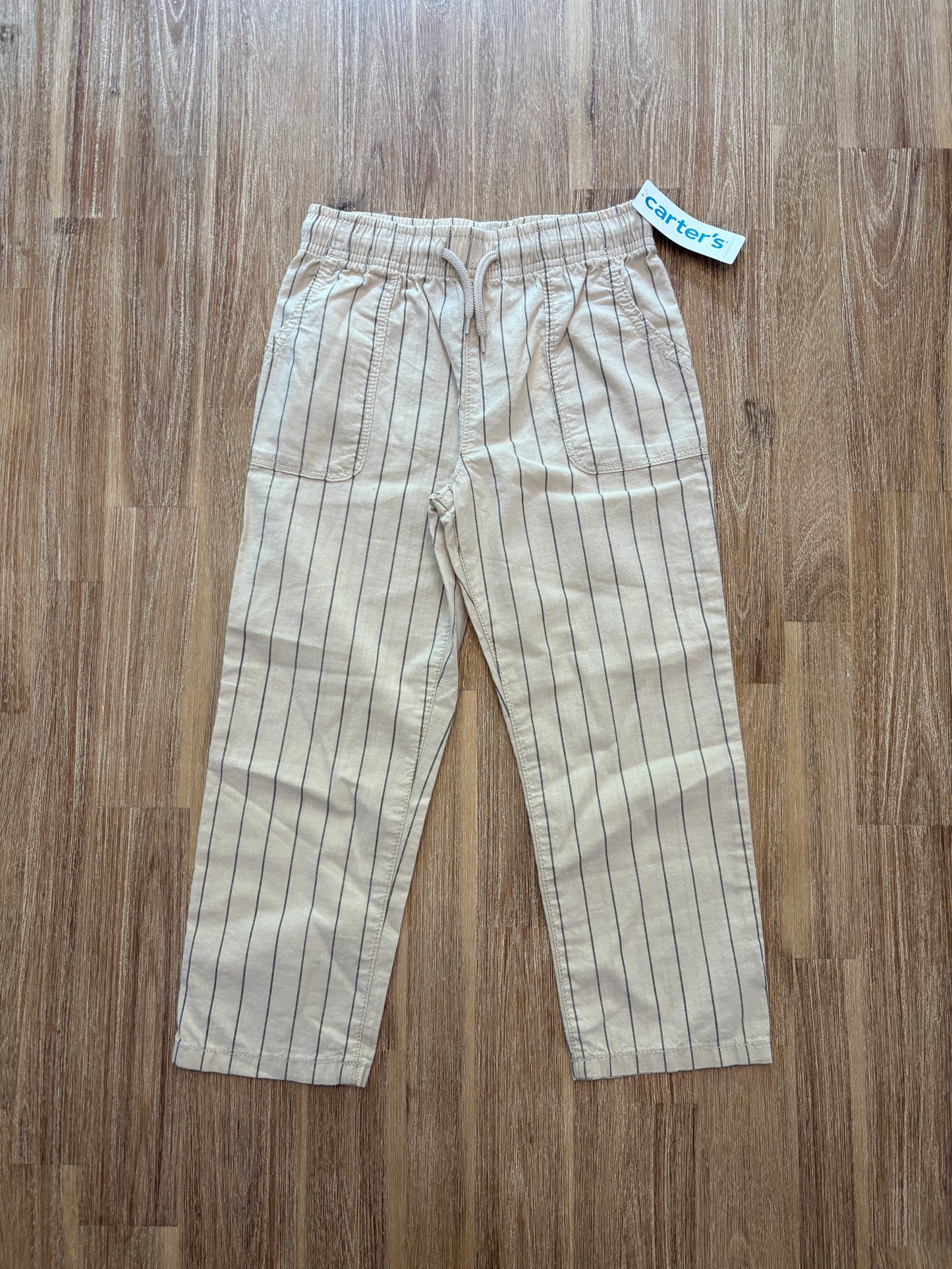 *Neuf* 5T / Carter’s