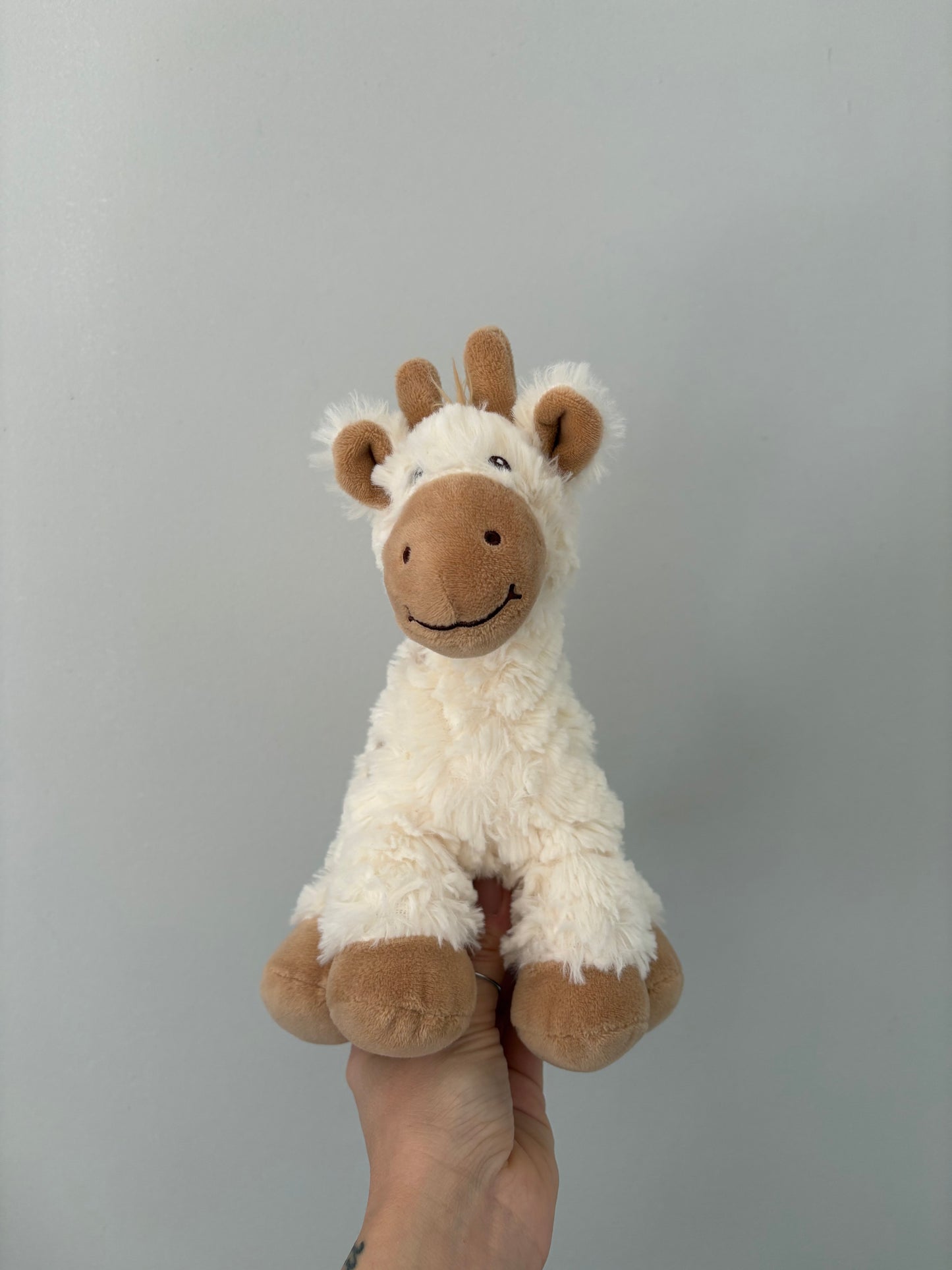 Peluche girafe / First Impression
